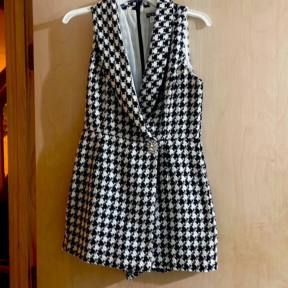 Size 8 Romper from Venus.. Black and white tweed.. Diamond button on front.